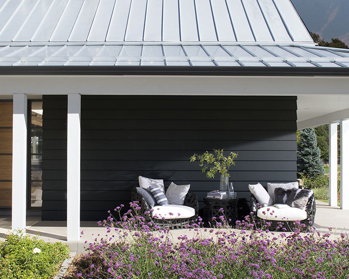 House exterior siding painted in Black Satin 2131-10 Regal® Select Paint color.